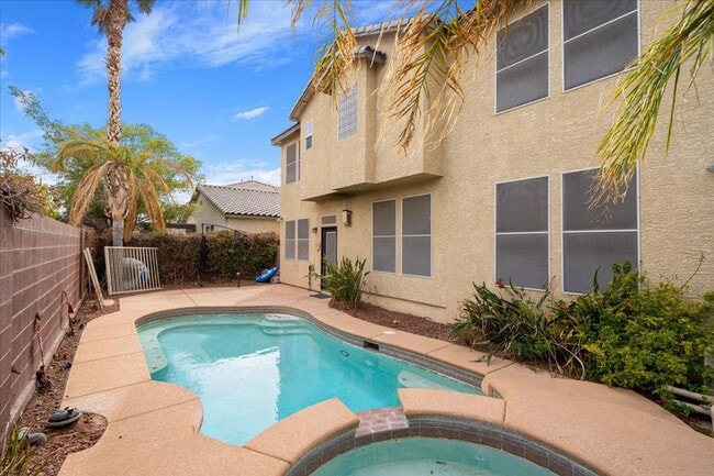 Building Photo - Gorgeous 4 Bedroom Home with Pool, Spa, and Abundant Space in Gated Community