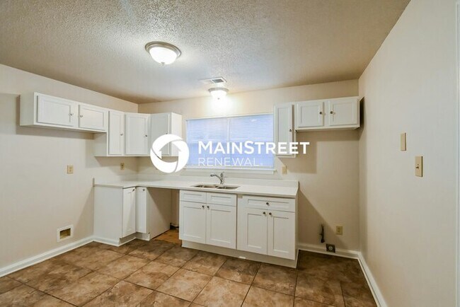 Building Photo - 4 Bedroom Pet-Friendly Home in MILLINGTON, TN with Main Street Renewal