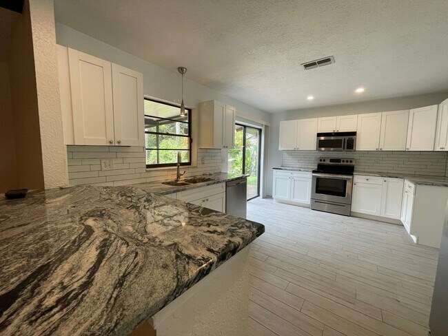Building Photo - Coming Soon! 3/2 Single Family - Great Loc...