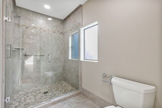 Building Photo - Stunning ALKI WATERFRONT Condo Overlooking Majestic Puget Sound!