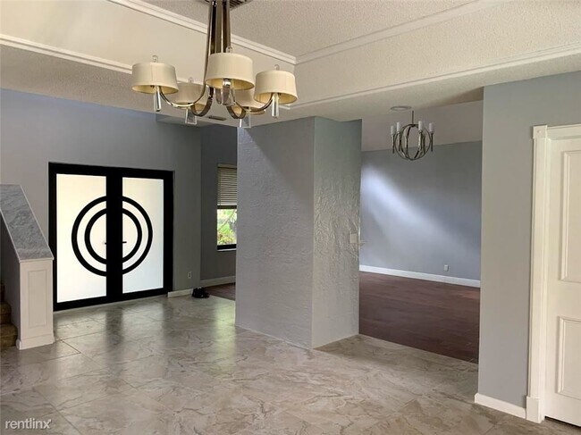 Building Photo - 4 br, 2.5 bath House - 10334 NW 6th Ct
