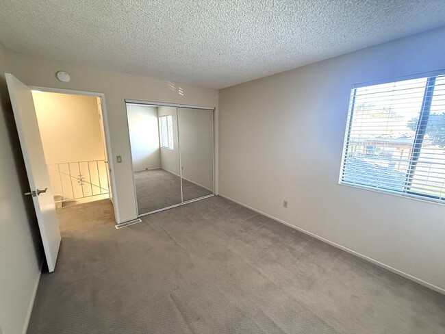 Building Photo - TWO BEDROOM / ONE BATH TWO-STORY CONDO IN ...