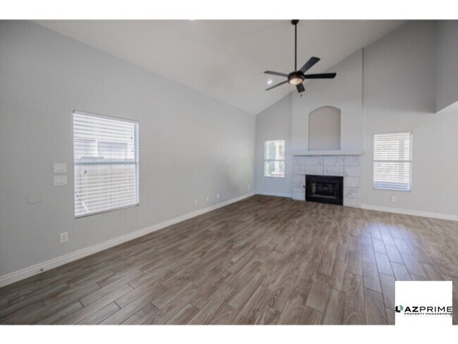 Building Photo - From The Moment You Arrive, This Gorgeous Remodeled 3/2.5 Peoria Home Captivates With Its Sun-Drench