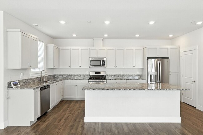Building Photo - Spacious 4-Bedroom Home, Plus Den/Office with Modern Upgrades and Great Amenities