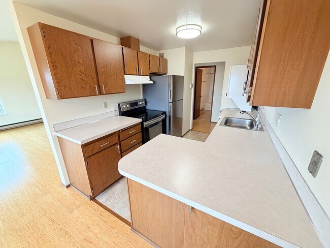 Building Photo - Bright Penthouse Corner Unit w/Garage Parking included - Panoramic Views in Ballard!