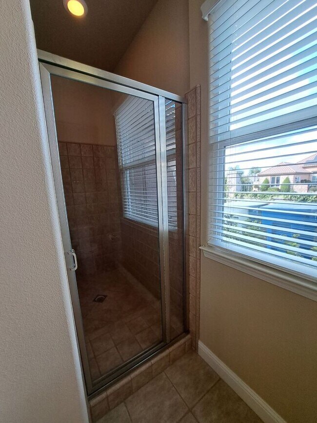 Building Photo - PRICE REDUCED TO $3795 – Custom Clovis Residence in Gated Community | Spacious Layout & 3-Car Gar...