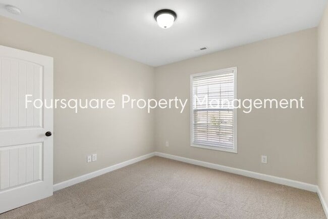Building Photo - Cozy Townhome with Fireplace, Private Back Patio,  Near US-1, I-540 & Shopping
