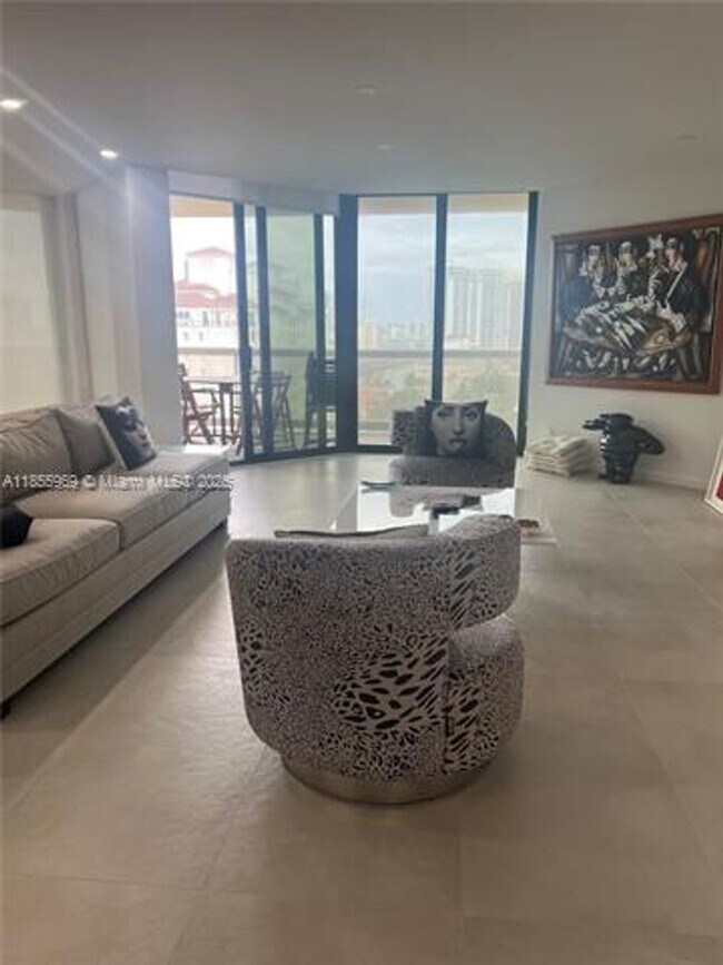 Building Photo - 20191 E Country Club Dr