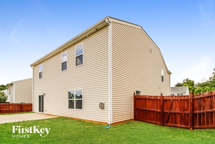 Building Photo - 6608 Championship Dr