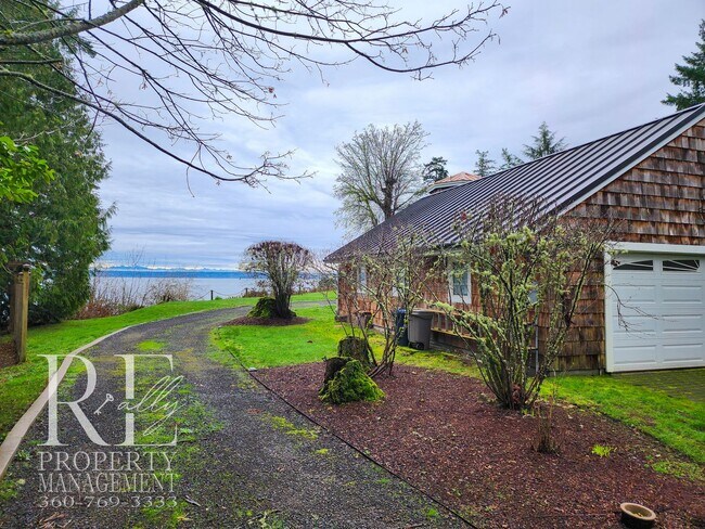 Building Photo - MOVE-IN SPECIAL: 50% OFF FIRST MONTHS RENT - Waterfront Rustic Retreat with Vaulted Ceilings, Pic...