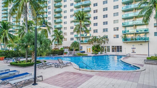 Building Photo - 19390 Collins Ave