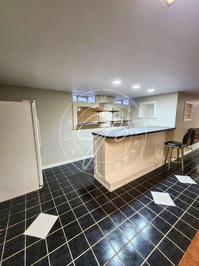 Building Photo - MUST SEE! Updated 3-Bedroom Home with Finished Basement & Large Fenced Yard