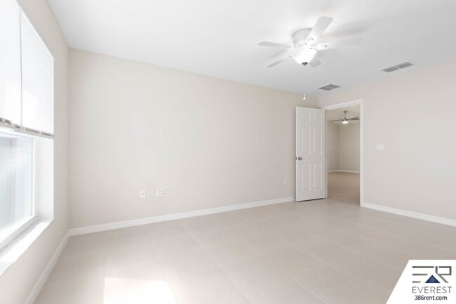 Building Photo - FULLY FENCED, LIKE- NEW 3/2/1 TOWNHOUSE ON A CUL DE SAC IN BEAUTIFUL SEMINOLE WOODS