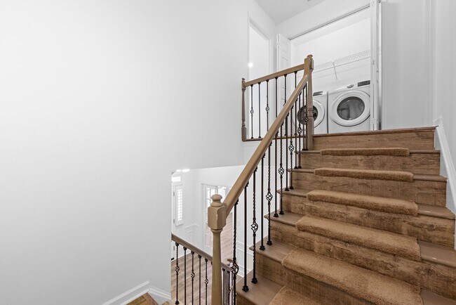 Building Photo - Rare Luxury 3-Story Townhome in Walton School District – Dual Kitchens, Double Decks & More!