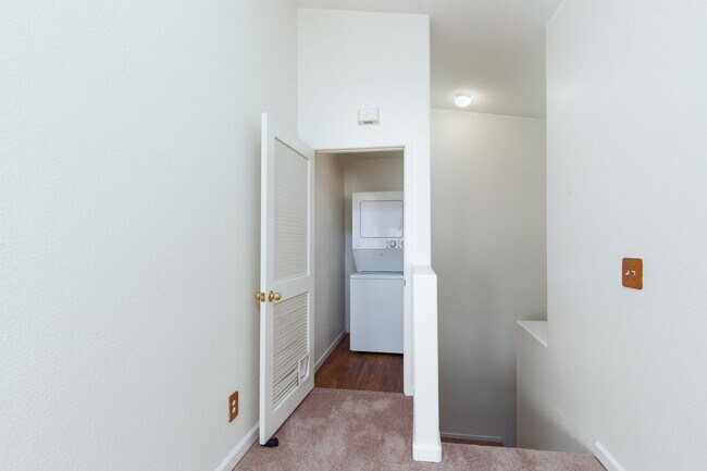 Building Photo - Two bedroom townhome with garage in gated ...