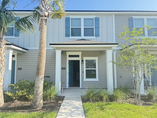 Building Photo - "Charming 2-Bedroom Townhouse Retreat with...