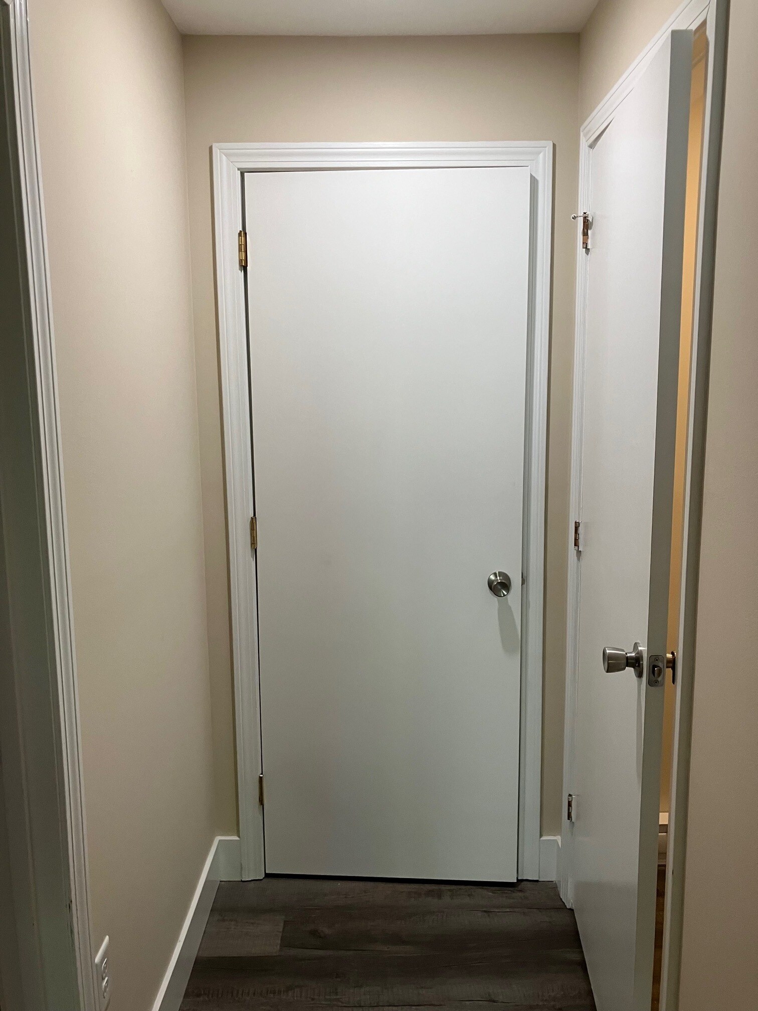 Storage at bottom of stairs - H5 Stonehedge Dr