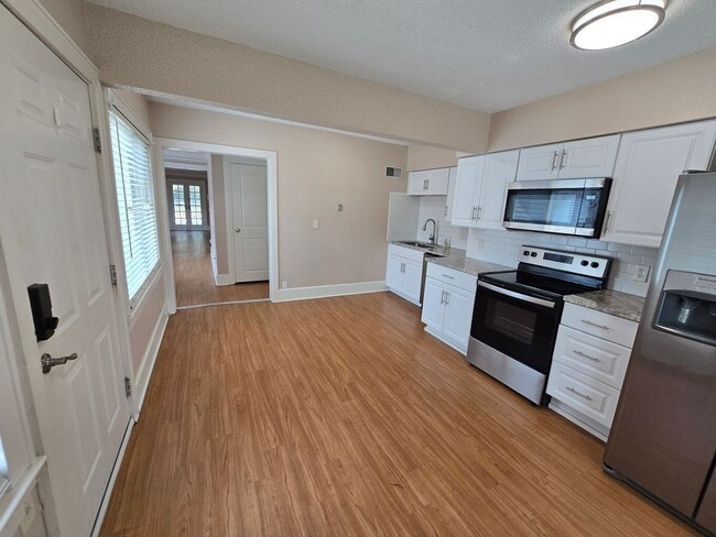 Building Photo - large three bedroom house with extra living space and finished basement