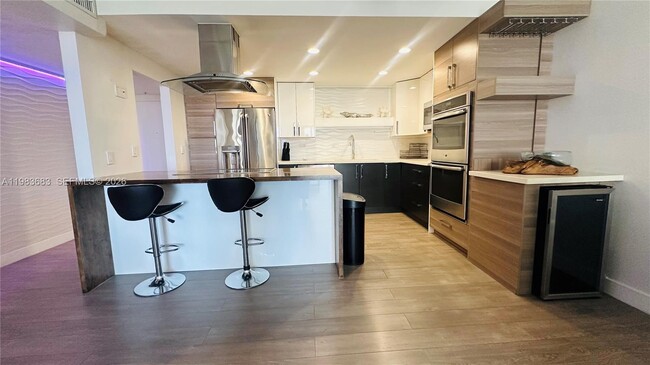 Building Photo - 19390 Collins Ave