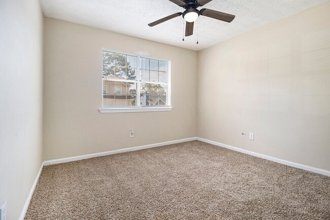 Building Photo - Rare Find: 4 Bedroom + 3 Bathroom + 2-Car ...