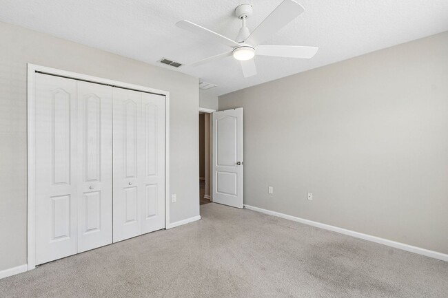 Building Photo - Modern 4BR Home with 3 Full Baths in River Glen | Screened Porch & Resort-Style Amenities