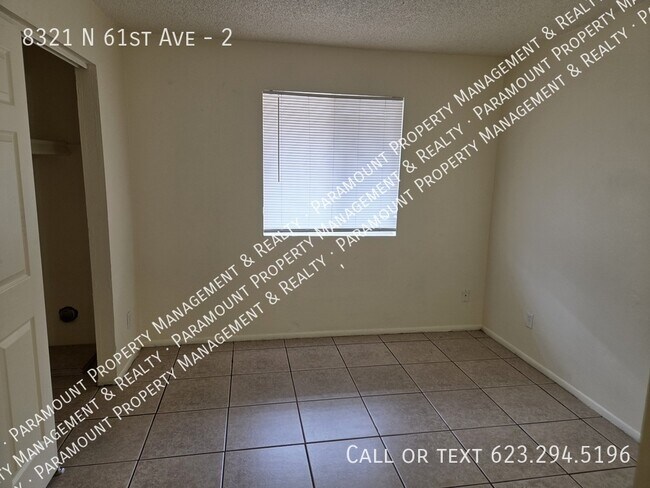 Building Photo - 8321 N 61st Ave