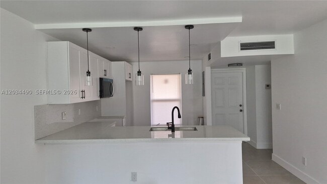 Building Photo - 6050 NW 64th Ave