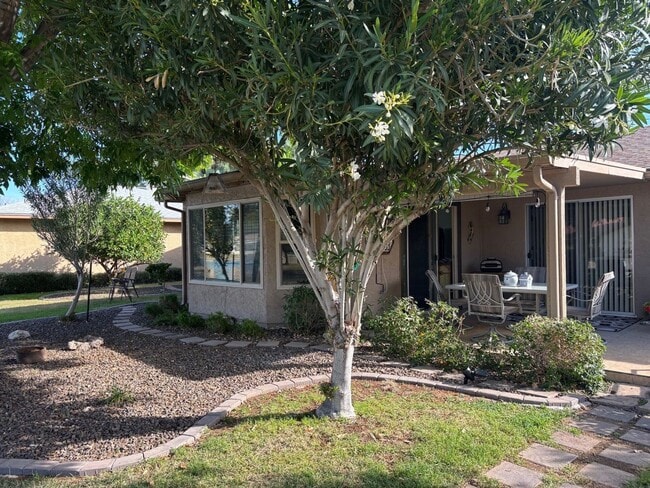 Building Photo - Welcome to this stunning updated 2-bedroom, 2-bathroom home on a lake located in the vibrant comm...