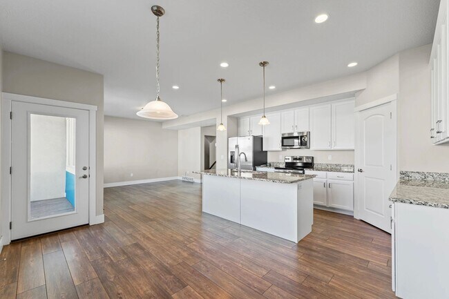 Building Photo - Upgraded 4-Bed Townhome with Finished Base...