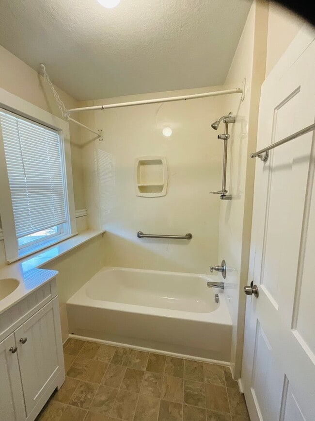 Building Photo - charming 2-bedroom home tucked within the heart of Colorado Springs, CO, and filled with an abund...