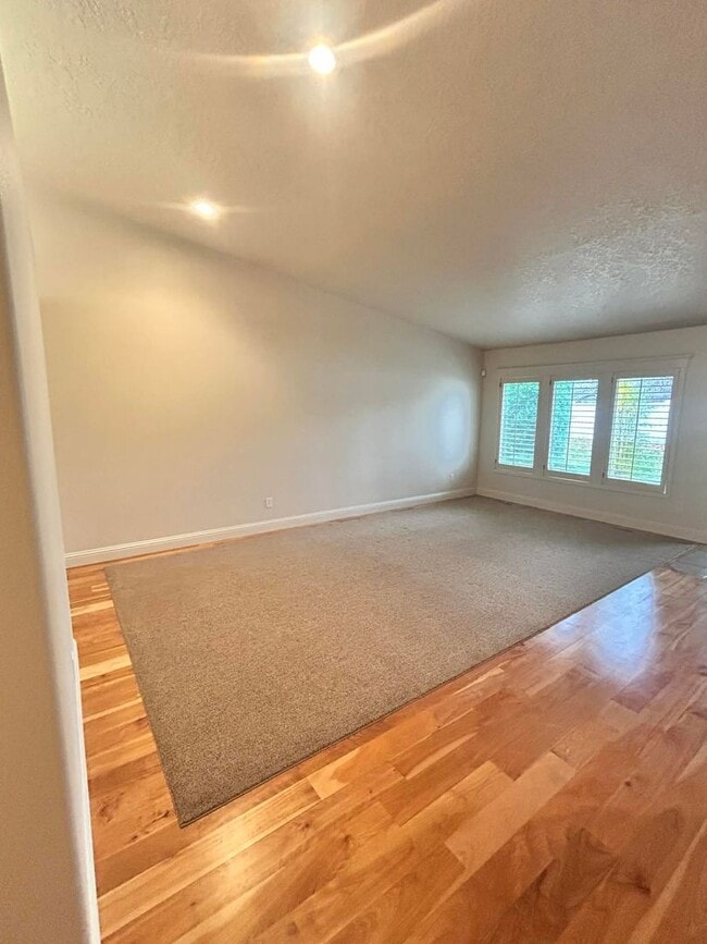 Building Photo - Spacious Duplex with 3-Car Garage & Private Patio!