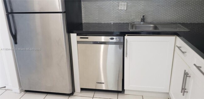 Building Photo - 8301 SW 142nd Ave