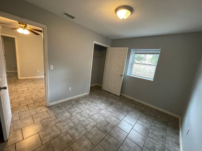 Building Photo - Open floor plan, four-bedroom two-bathroom with washer and dryer
