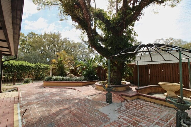 Building Photo - Stunning 3-Bed, 2-Bath Spanish-Inspired Custom Home with Elegant Gardens & Fountains