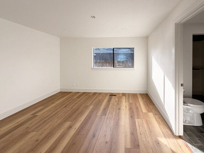 Building Photo - Renovated 4BR/2BA Boise Home – Modern Kitchen, Vaulted Ceilings & Fenced Backyard, Minutes to BSU...