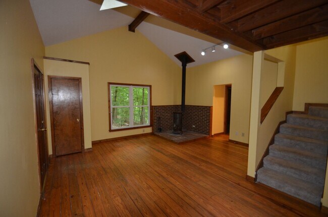 Building Photo - Private Wooded Retreat Near UNC with Vaulted Ceilings & Cozy Woodstove