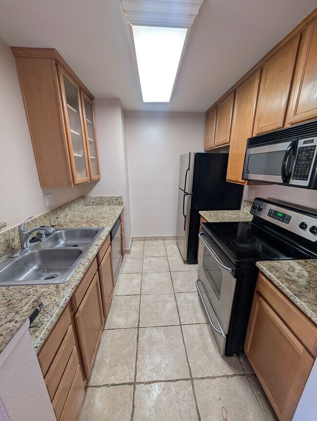 Building Photo - Upgraded UTC Condo in Quiet, Serene Setting