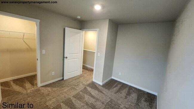 Building Photo - "Modern Luxury: Spacious 4-Bedroom Home with Open-Concept Design"