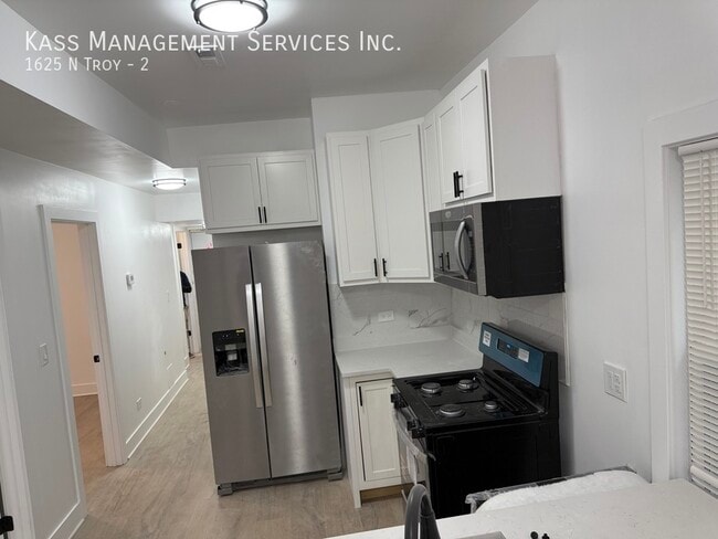 Building Photo - 1625 N Troy-2