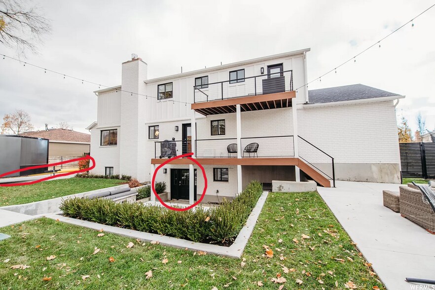 This image shows the entrance in the backyard and your drive way (the trailer isn't there anymore) - 1136 Fairway Cir