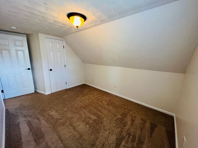 Building Photo - Unit is no longer available - application approved.  Charming 1 1/2 story brick home with basemen...