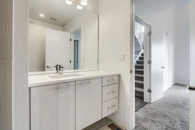 Building Photo - Modern LoHi Living with Rooftop Deck & City Views!!