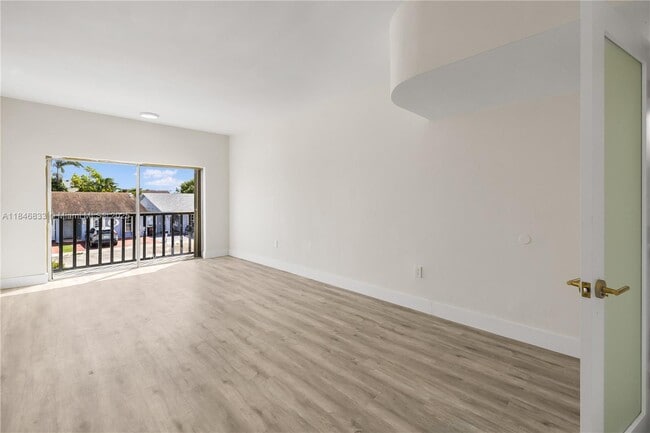 Building Photo - 3860 W 10th Ct
