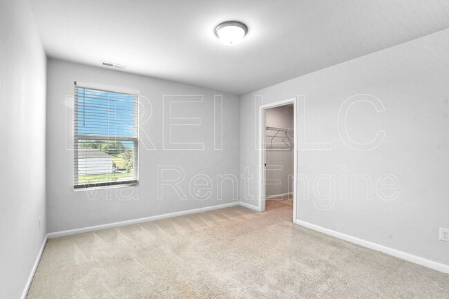 Building Photo - 9211 Tamarack Grove Ln