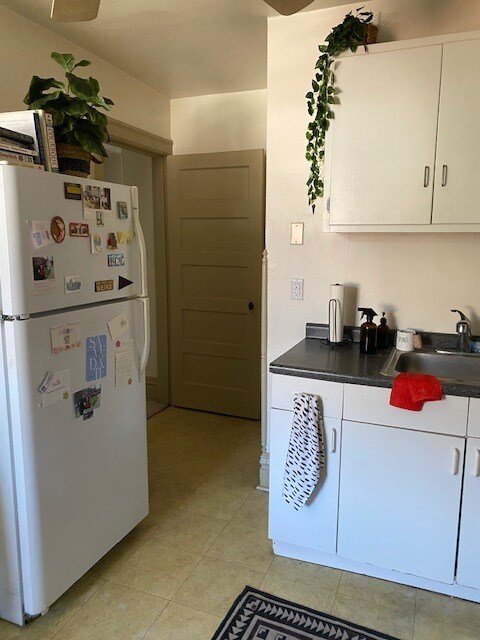 Kitchen looking out towards hallway - 1360 Denniston St