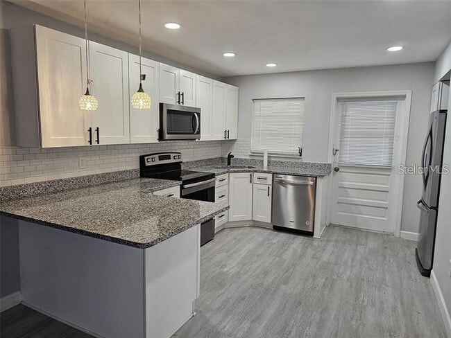 Building Photo - 4461 87th St Ct W