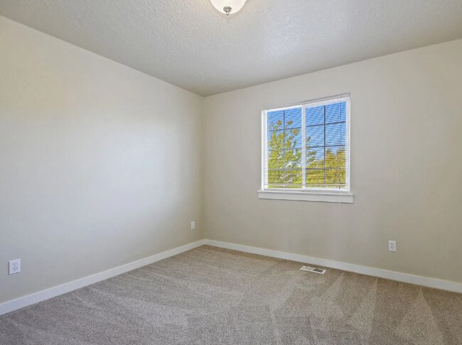 Building Photo - Spacious 4-Bedroom Home with 3-Car Garage