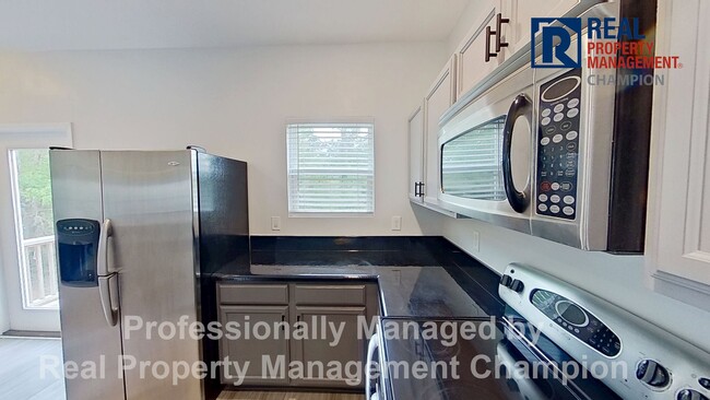 Building Photo - Spacious 3-Story Townhome in the Heart of Carolina Beach — Backs to State Park