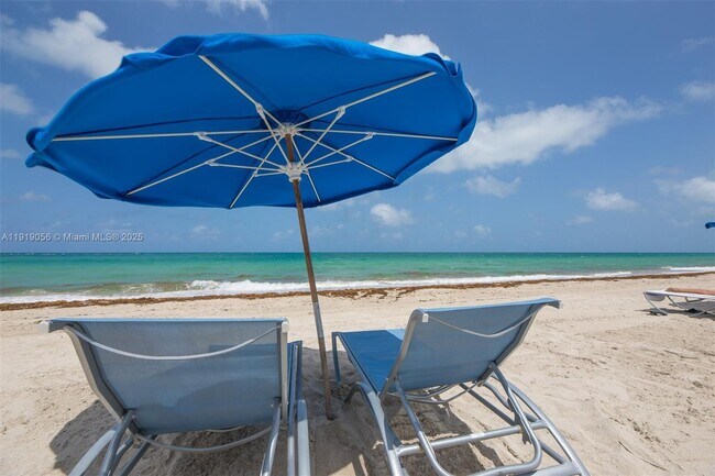 Building Photo - 10275 Collins Ave