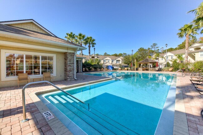 Building Photo - Beautifully Updated & Spacious 3BR/2BA Condo in a Secure Gated Community — Includes Cable, Intern...